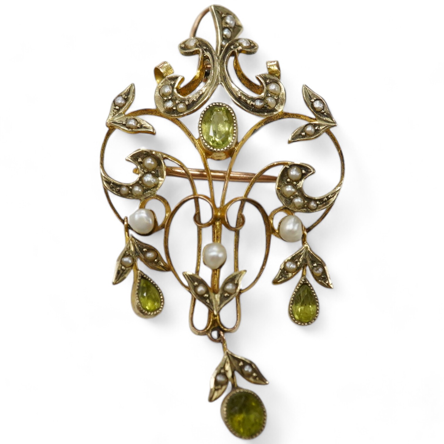 An early 20th century 9ct, peridot and seed pearl cluster set drop pendant brooch, 53mm, gross weight 5 grams. Condition - fair